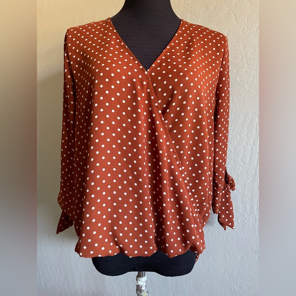 Polka dots faux wrap top